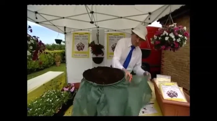 Fold the liner over the rim and secure with twine.