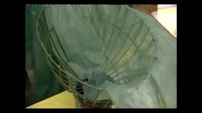 Position the second piece of liner material, overlapping the first in the center by approximately six inches.