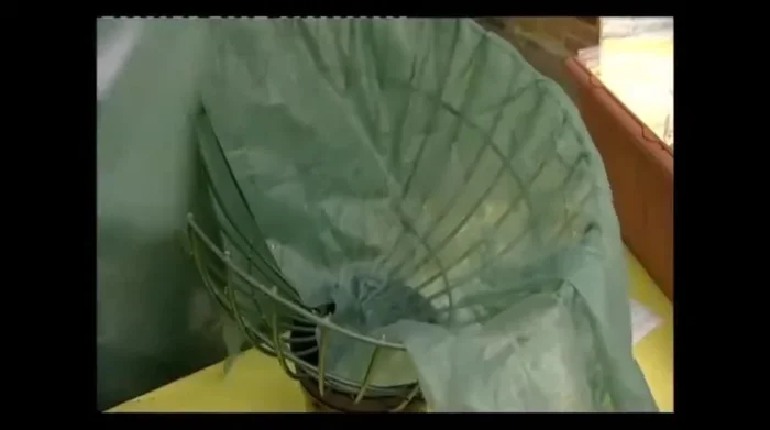 Position the second piece of liner material, overlapping the first in the center by approximately six inches.