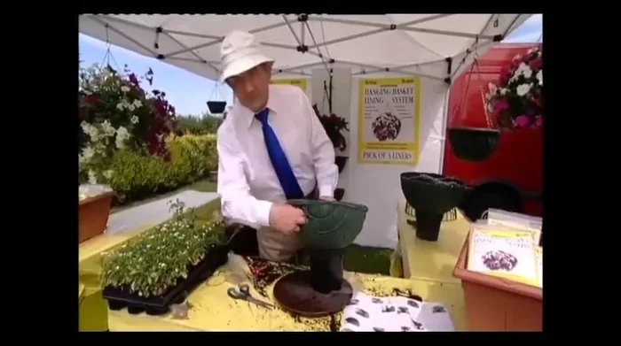 Firm the compost around the plants.