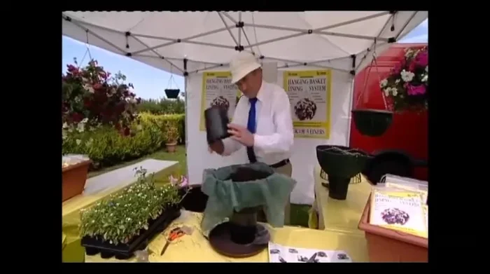 Fill the basket with compost to the top.