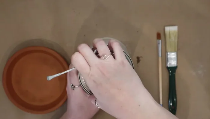 Open the Rust-Oleum Ultra Cover Gloss and stir well with a paintbrush or stir stick.