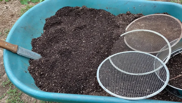 Add soil amendments such as Dr. Iron (for pH adjustment), dry molasses (for microbes), kelp meal, azomite, and humate (optional, for additional nutrients).