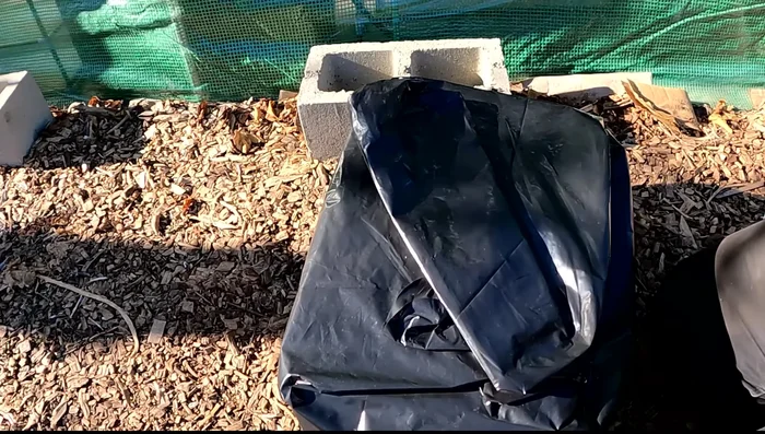 Tape the bag securely to the box using Gorilla tape (optional: clean with isopropyl alcohol for better adhesion).