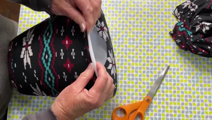 Trim excess fabric to create a neat finish.