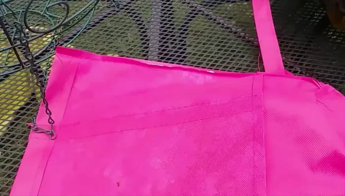 Prepare the shopping bag: Cut off the handles and turn the bag inside out.