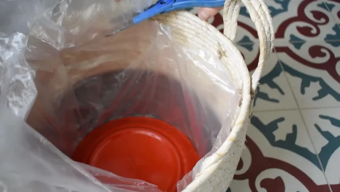 Trim away excess liner. Flatten down any remaining bits.