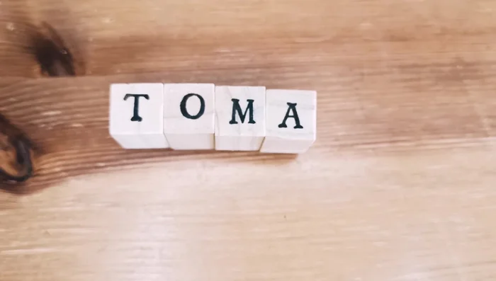 Write the plant names onto the tags.