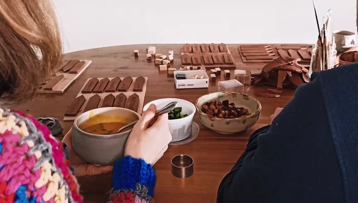 Once dry, bake the plant tags according to the clay's instructions (this step is mentioned but details aren't provided in the transcript).