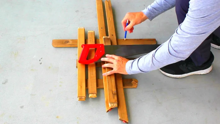 Sand the ends of the wood pieces to smooth them out.