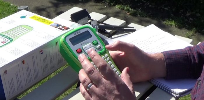 Print the label using the green button. Use the cutter to neatly separate the label.