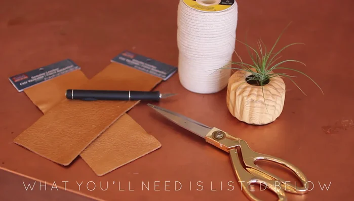 Use an X-acto knife to make an X-shaped hole in each corner of the leather pieces.