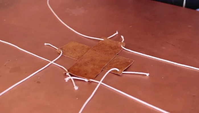 Repeat steps 3 and 4 for the second leather piece.